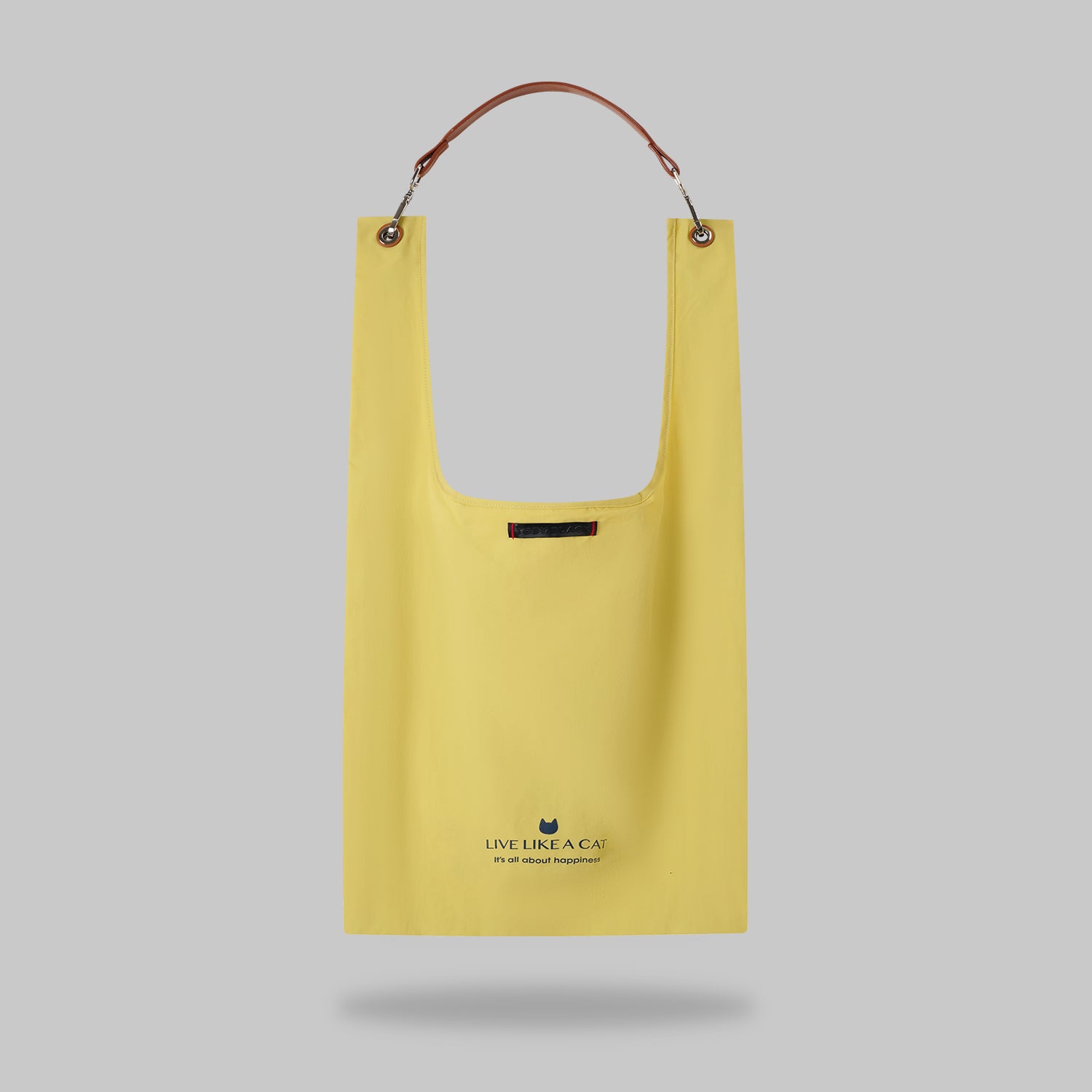 Back view emphasizing the clean minimalist look of yellow bag