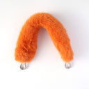 Orange faux fur strap with silver clasps isolated view