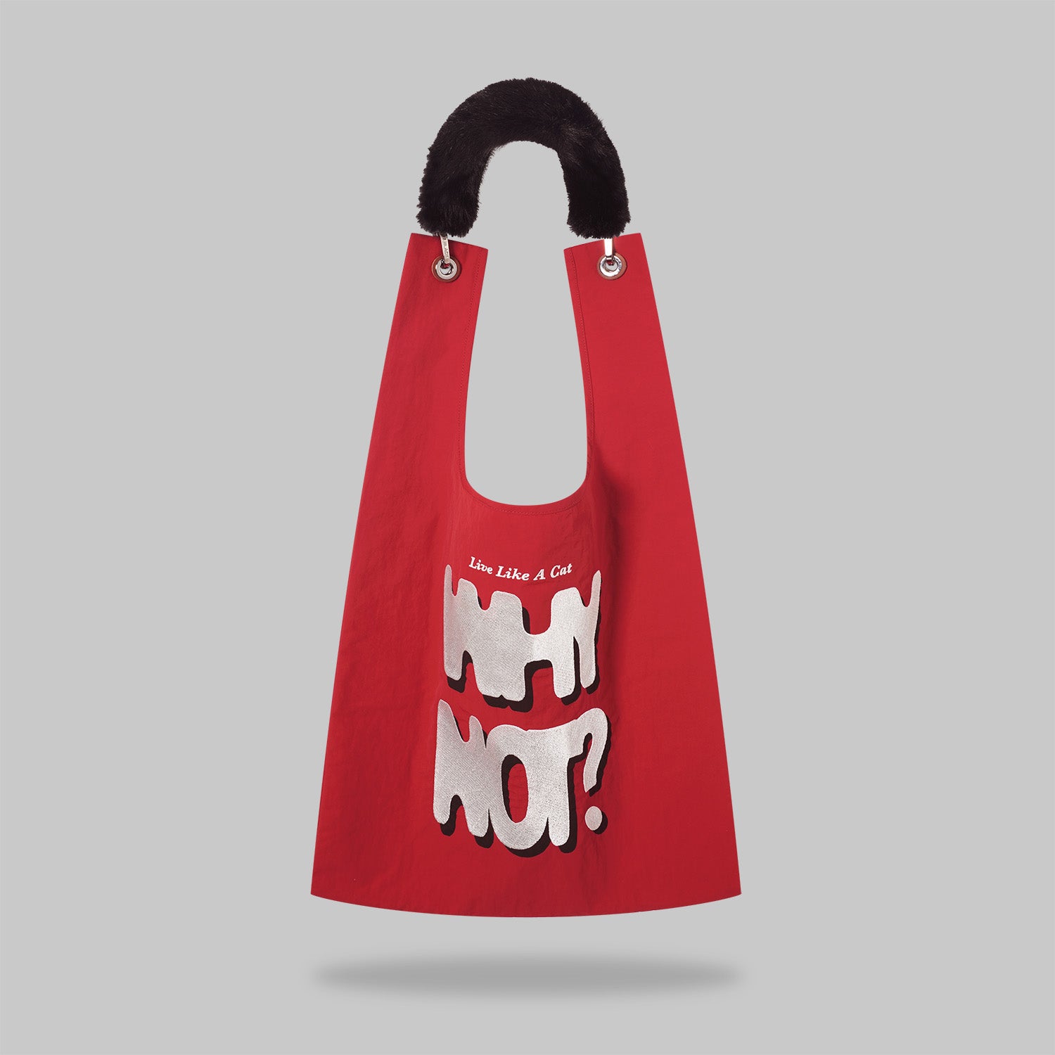 "WHY NOT? Toby Bag - Front view showing bold white dripping text graphic on red nylon with black faux fur handle"