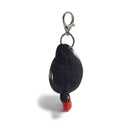 Black plush keychain with red accents on a white background