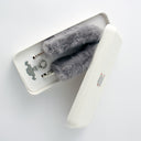 Phone case with fux fur trim keychain strap on a white background