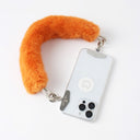 Phone case with orange faux fur key chain strap