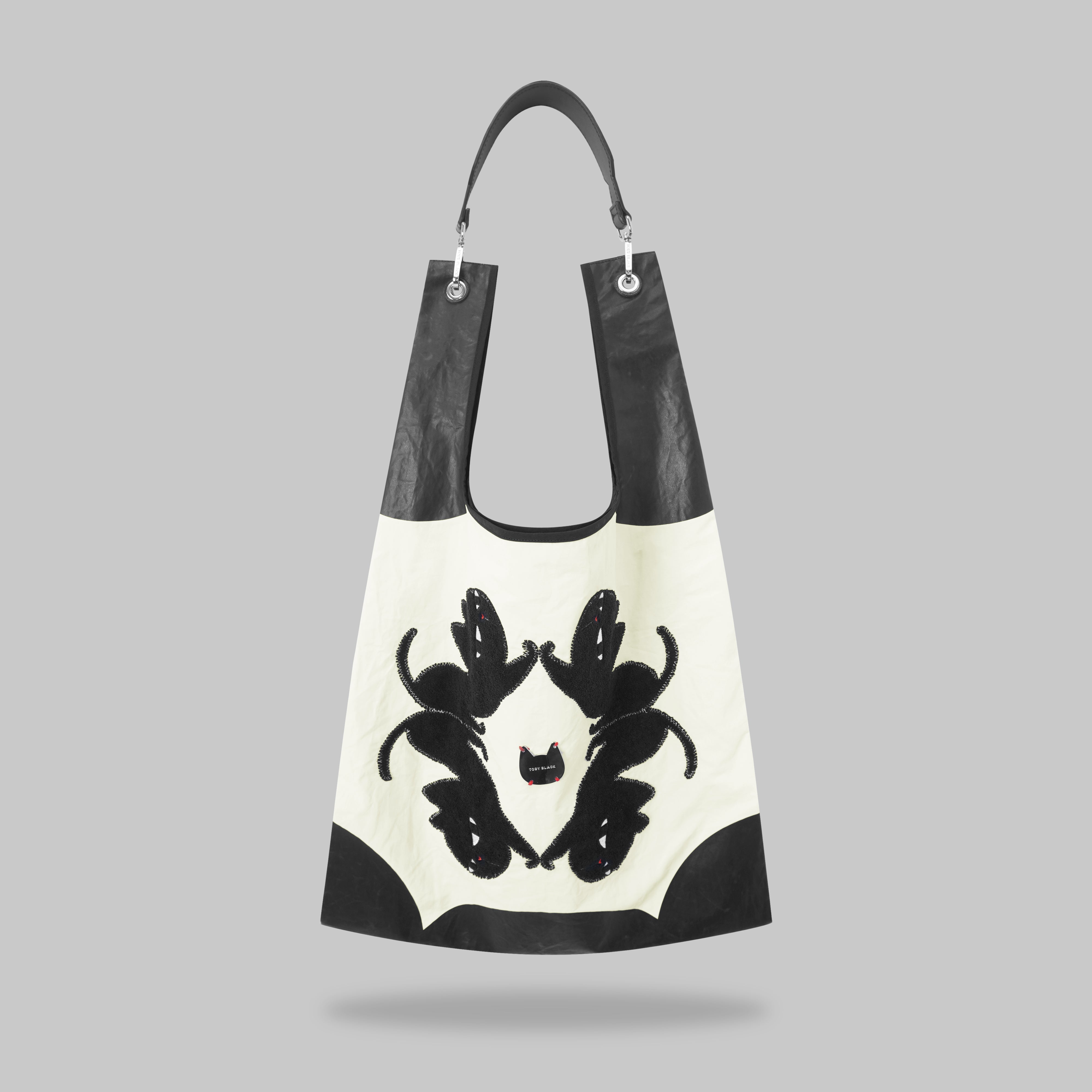 Mirror Me cat tote bag with artistic design