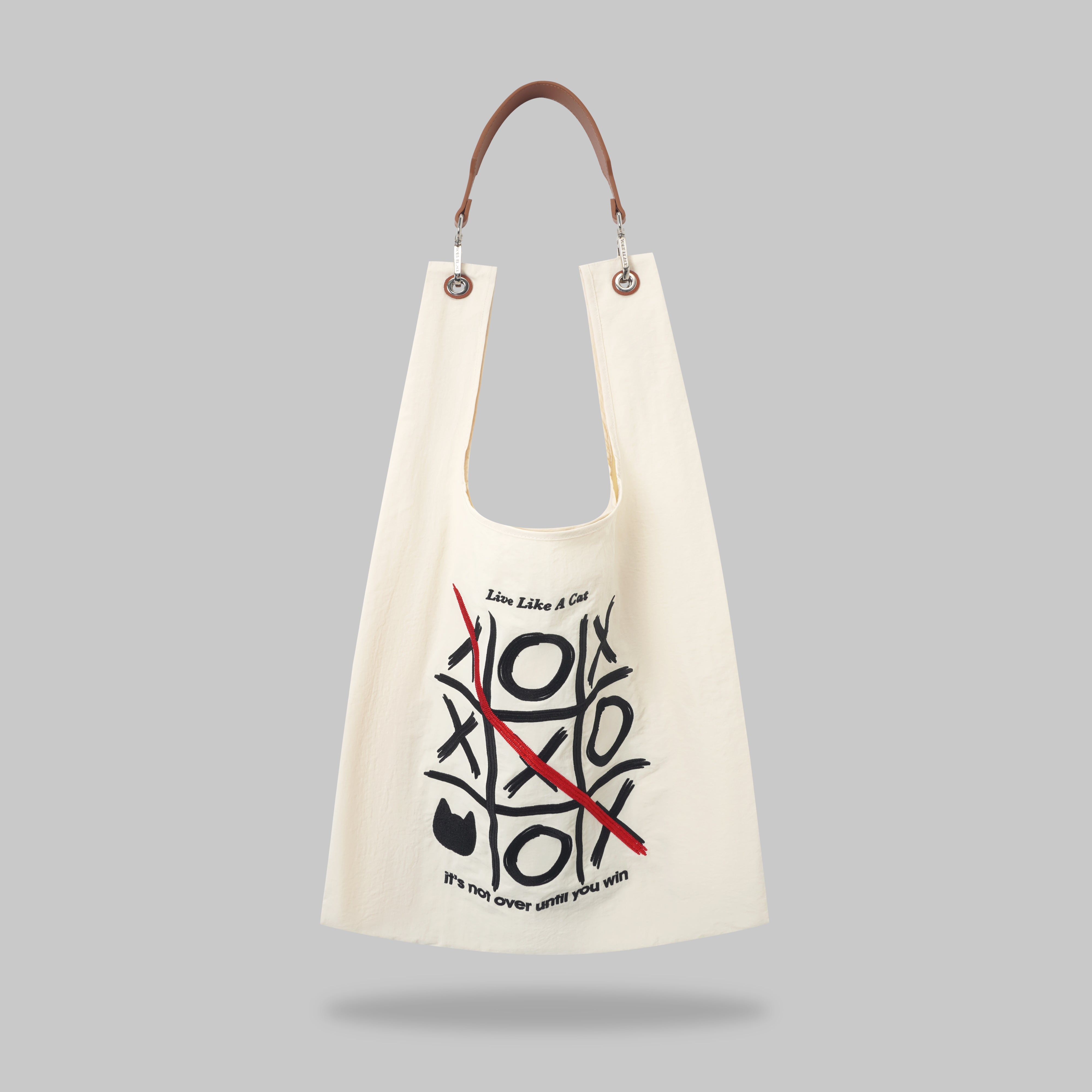 Tic-Tac-Paw cat tote bag for every victory