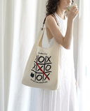 Cat tote with Tic-Tac-Paw design
