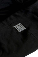 Gray cat logo patch on black hoodie fabric