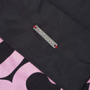 Premium Toby Black branding detail on bag