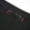  branding detail on the back of Too Much To Do tote